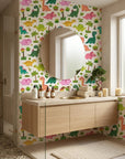 Jurassic Bloom green botanical dinosaur wallpaper creating ambiance in a serene bathroom
