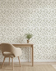 Khaki Leaf removable wallpaper on minimalist home office wall with natural wood desk and chair