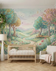 Whimsical Lantern Wood wallpaper mural featuring pastel forest scene with trees, flowers, and winding path in nursery