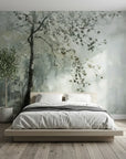 Sage green and gray Last Leaves botanical wallpaper with painted tree branches on minimalist bedroom wall