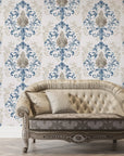 Blue and taupe Lavish Flower Mosaic damask wallpaper on living room wall with vintage sofa