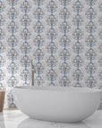 Blue and taupe Lavish Flower Mosaic damask wallpaper in elegant bathroom setting with freestanding tub