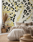 Removable wallpaper featuring yellow tropical foliage alongside a distinctive leopard spot pattern