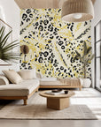 Self-adhesive wall covering featuring yellow tropical leaves merged with a leopard spot design, known as Leopard Bloom