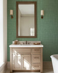 Green and white crosshatch patterned self-adhesive wallpaper in a mid-century modern style