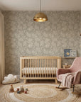 Lunar Foliage symmetrical floral wallpaper adding character to a cozy bedroom