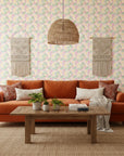 Matisse Meadow playful pastel floral wallpaper in a warm and inviting living room