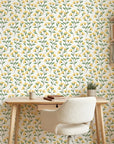 Meadow Light yellow floral peel and stick wallpaper as a feature wall in a bright home office