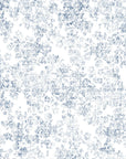 Distressed blue and white Midnight Bloom Drift wallpaper with watercolor-style floral texture on cream background