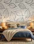 Linen textured Midnight Fossil wallpaper with navy leaf sketches on bedroom accent wall