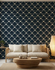 Midnight Mosaic navy and ivory abstract wallpaper in a warm and inviting living room
