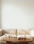 Morning Dew serene light blue and gold art deco wallpaper creating ambiance in a serene bathroom