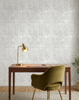 Morning Frost grey abstract weave wallpaper as a feature wall in a bright home office