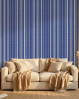 Nautical Code blue and white striped wallpaper in a warm and inviting living room