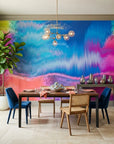 Neon Tide vibrant blue and pink abstract wallpaper as a feature wall in a bright home office