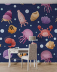 Deep navy oceanic creatures in soft watercolor on non-reflective self-adhesive wall covering - Ocean Bloom