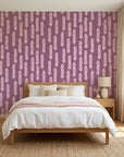 Orchid Veil serene purple cascading leaf wallpaper adding character to a cozy bedroom