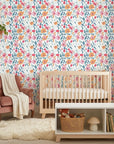 Painted Blooms pastel floral peel and stick wallpaper as a feature wall in a bright home office