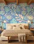 Painted Breeze pastel palm wallpaper adding character to a cozy bedroom