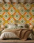 Painted Earth warm terracotta and green tribal wallpaper in a warm and inviting living room