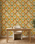 Painted Earth warm terracotta and green tribal wallpaper adding character to a cozy bedroom