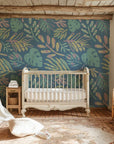 Removable wallcovering featuring a non-reflective light blue surface and exotic leaf patterns - Painted Breeze