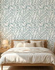Pale Grove serene blue botanical wallpaper adding character to a cozy bedroom