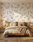 Paper Planes playful skybound motion wallpaper as a feature wall in a bright home office