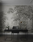 Gray and white Park Promenade toile wallpaper featuring detailed forest scene in modern home office setting