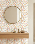 Peach Bloom coral floral peel and stick wallpaper creating ambiance in a serene bathroom