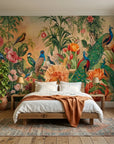 Peacock Garden wallpaper with exotic birds and coral flowers on bedroom accent wall