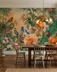 Peacock Garden wallpaper featuring exotic birds, coral peonies, and lush botanicals on peach backdrop in dining room