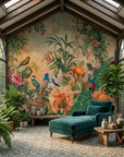 Peacock Garden wallpaper with tropical birds and florals in sunlit conservatory with teal velvet chaise