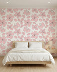 Petal Drift blush pink cherry blossom wallpaper adding character to a cozy bedroom