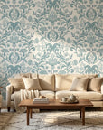 Petal Reflection soft blue floral damask wallpaper in a warm and inviting living room