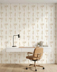 Petal & Thread elegant golden botanical floral wallpaper as a feature wall in a bright home office