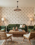 Petal Procession bohemian coral paisley wallpaper in a warm and inviting living room