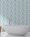 Teal and white Petal Reflection damask wallpaper behind modern bathroom freestanding tub