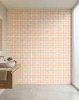 Picnic Check yellow and pink plaid wallpaper creating ambiance in a serene bathroom