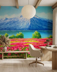 Pink Ascent bold mountain and wildflower meadow wallpaper as a feature wall in a bright home office