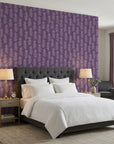 Plum & Vine serene purple trailing leaf wallpaper adding character to a cozy bedroom