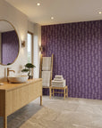 Plum & Vine serene purple trailing leaf wallpaper creating ambiance in a serene bathroom
