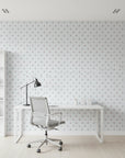 Poppy Ribbon playful blue striped floral wallpaper as a feature wall in a bright home office