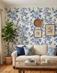 Porcelain Spring blue and white chinoiserie floral wallpaper in a warm and inviting living room