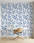 Porcelain Spring blue and white chinoiserie floral wallpaper as a feature wall in a bright home office