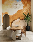 Raw Earth warm ochre textured abstract wallpaper as a feature wall in a bright home office
