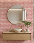 Red Rain textured pink and red vertical stripe wallpaper creating ambiance in a serene bathroom