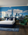 Manhattan skyline Rising wallpaper mural with blue sky and clouds on modern bedroom accent wall