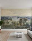 Impressionist River Valley Panorama mural wallpaper featuring soft greens and blues in modern living room