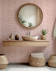 Geometric ogee print, shimmering in metallic rose gold and pink, applied as peel and stick wallpaper (Rose Bloom)